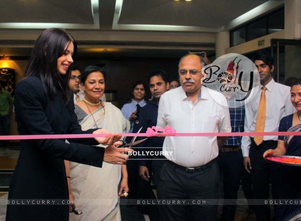Kalki Koechlin cuts a ribbon at the Annual Film Festival of India Habitat Centre