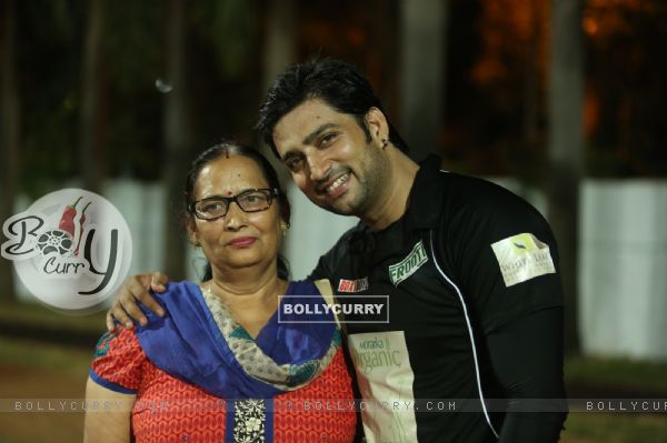 Aadesh Chaudhry poses with mother at Gold Charity Match