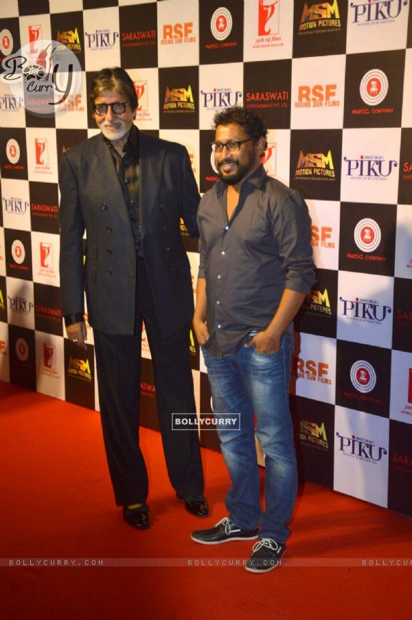 Shoojit Sircar and Amitabh Bachchan pose for the media at the Success Bash of Piku