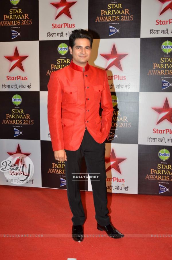 Karan Mehra poses for the media at Star Parivaar Awards 2015