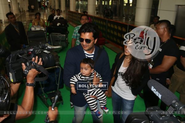 Riteish Deshmukh poses with Genelia and their Son Riaan at KL Airport