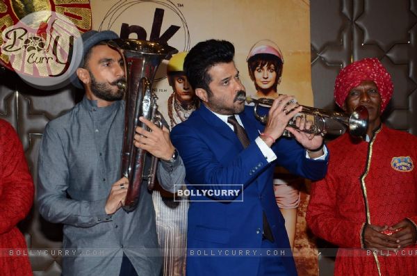 Pe Pe Pe Peee! Ranveer and Anil Try on Some Music Instruments at Success Bash of PK