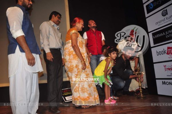 Kushal Punjabi lights the lamp at Toshi Rana's Concert