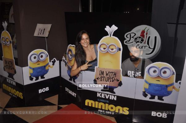 VJ Andy and Elli Avram poses for the media at the Premier of Minions