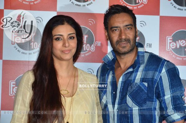 Ajay Devgn and Tabu pose for the media at the Promotions of Drishyam on Fever FM (370338)