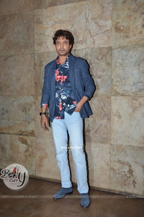 Irrfan Khan poses for the media at the Special Screening of Amy