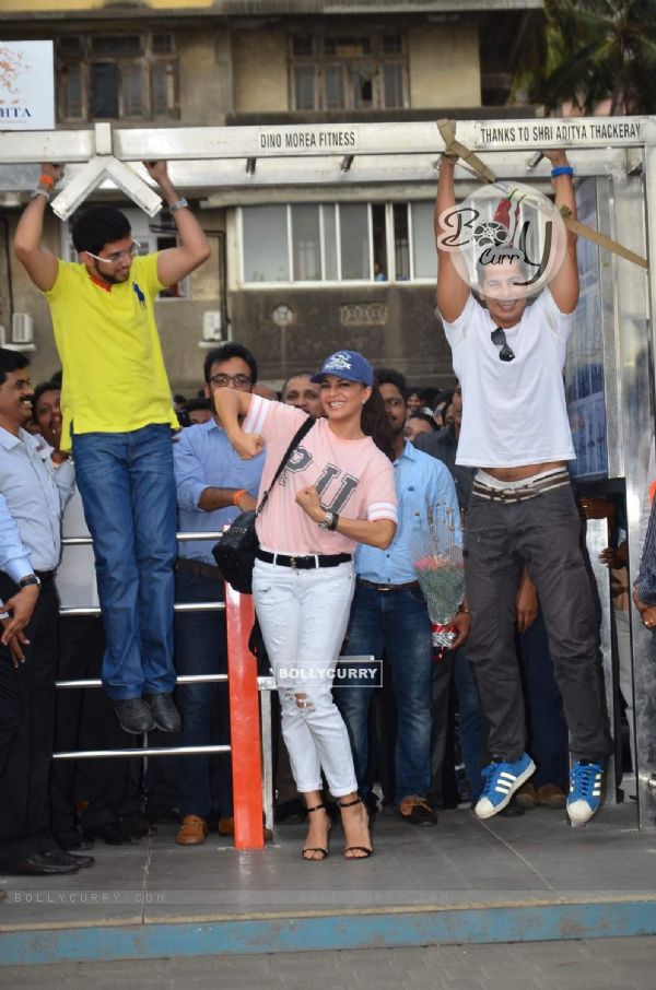 Aditya Thackeray and Dino Morea were snapped doing push ups at the Launch of Free Public Gym