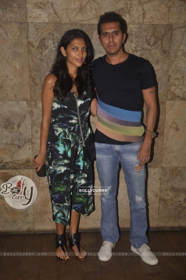 Ritesh Sidhwani poses with his wife at the Screening of Bajrangi Bhaijaan