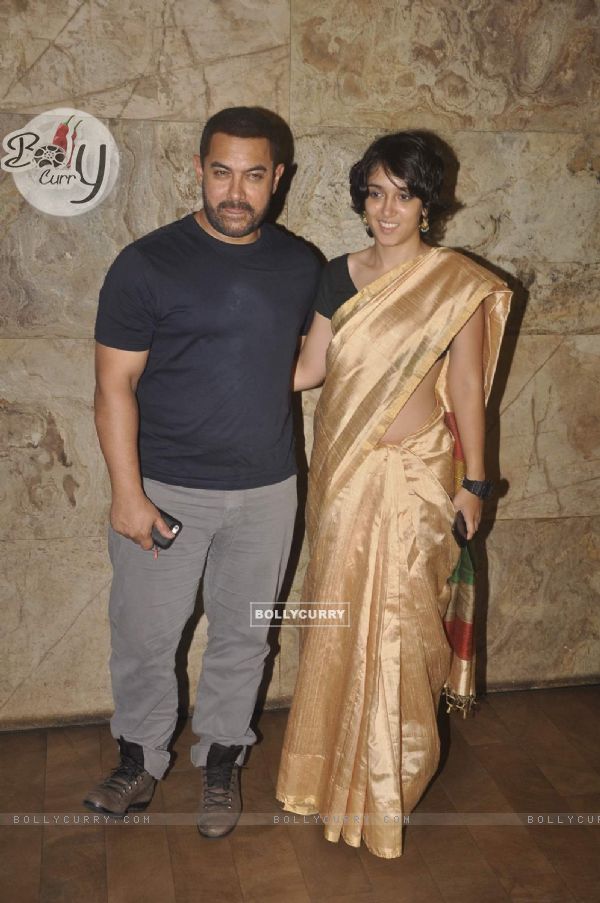 Aamir Khan poses with daughter Ira Khan at the Screening of Bajrangi Bhaijaan