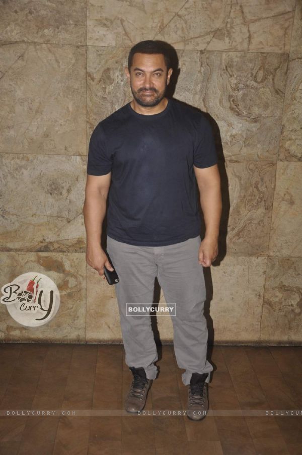Aamir Khan poses for the media at the Screening of Bajrangi Bhaijaan