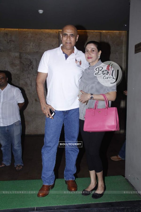 Puneet Issar poses with Wife at the Screening of Bahubali