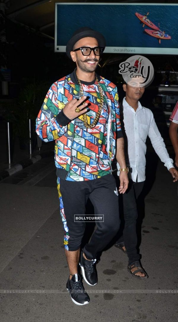 Ranveer Singh poses for the media at Airport