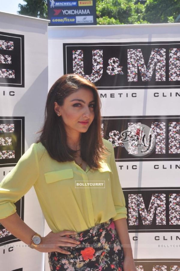 Soha Ali Khan poses for the media at the Launch of 'U and Me Salon'