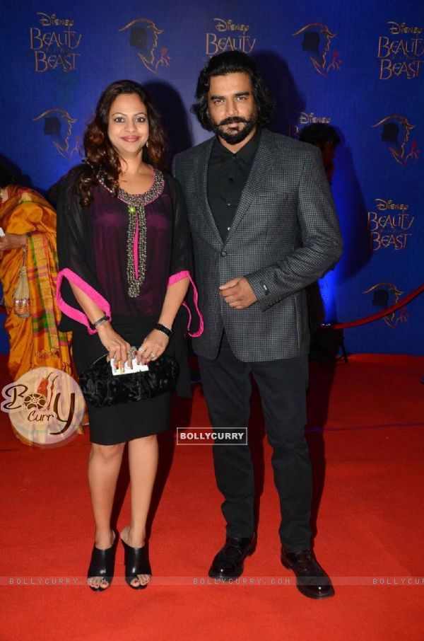 R . Madhavan with his Wife at Screening of Beauty and The Beast