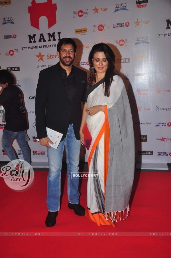 Kabir Khan poses with wife Mini Mathur at MAMI Film Festival Day 1