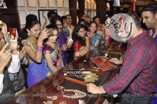 Salman Khan checks out jewelry at the Launch of P N Gadgil Jewellers new logo