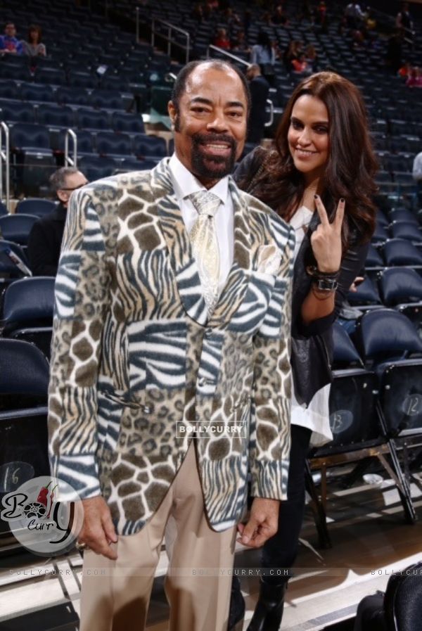 Neha Dhupia with NBA Legend Walk Frazier at the NBA Game in New York