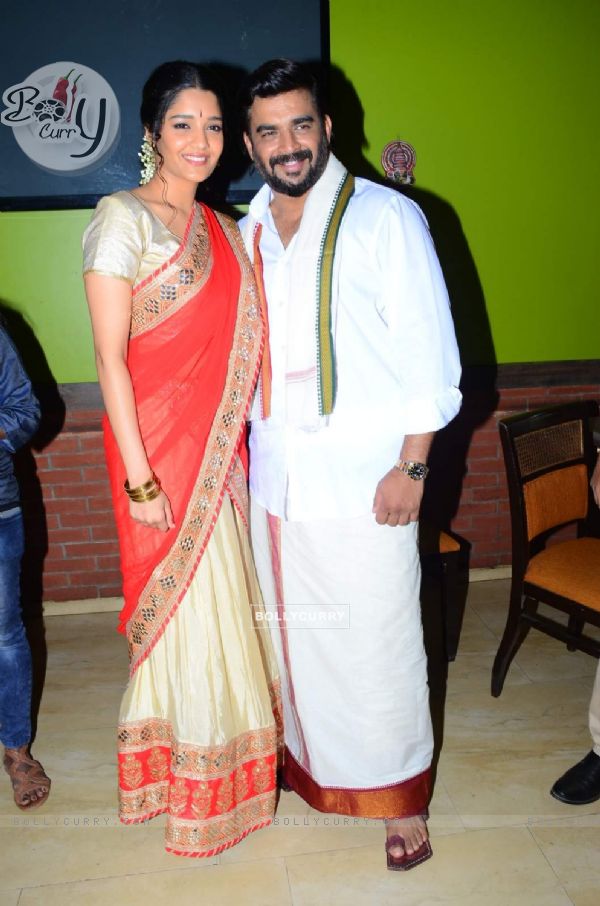 R. Madhavan and Ritika Singh pose for the media at Pongal Celebrations (391480)