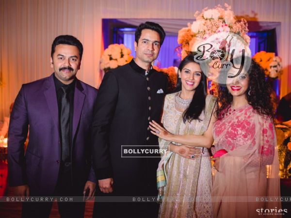 Asin Thottumkal and Micromax Founder Rahul Sharma Poses with friends at Wedding Reception