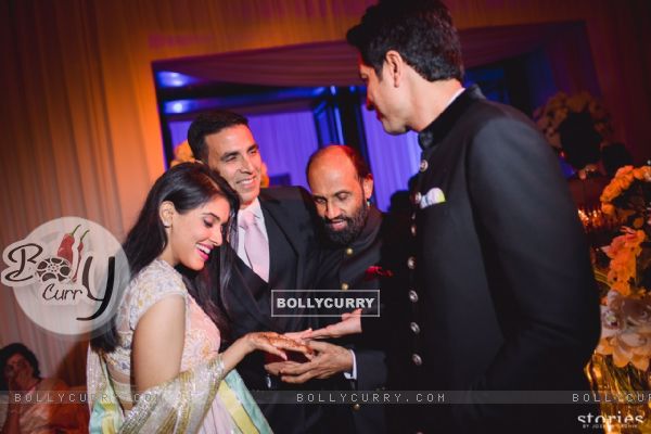 Akshay Kumar Greets Asin Thottumkal and Rahul Sharma at their Wedding Reception