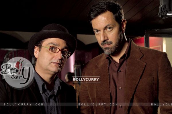 A still image of Rajat Kapoor and Vinay Pathak