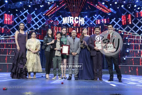Celebs pose for the media at Mirchi Music Awards 2016
