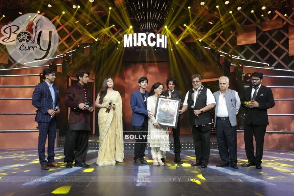 Celebs pose for the media at Mirchi Music Awards 2016
