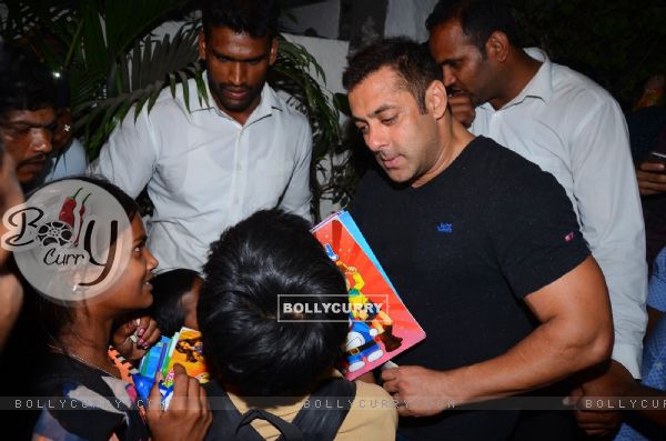 Salman Khan Snapped Distributing books to street Kids Outside Olive