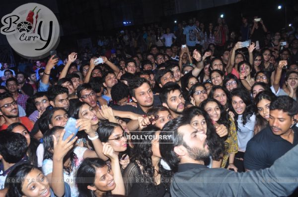 Fawad Khan takes a selfie with students at Mithibai college during promotions of Kapoor & Sons