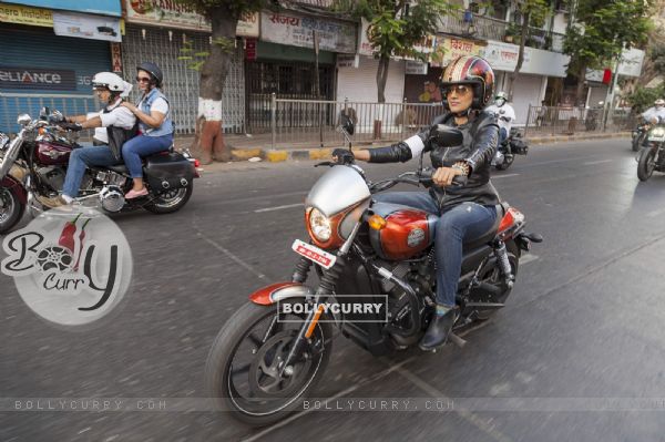 Sonali Kulkarni rides on a Harley Davidson Bike