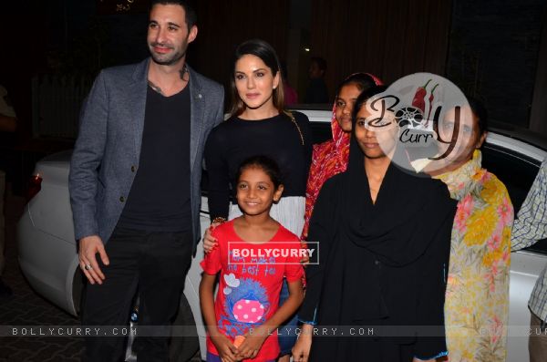 Sunny Leone Poses with fans post Party at Aamir Khan's Residence