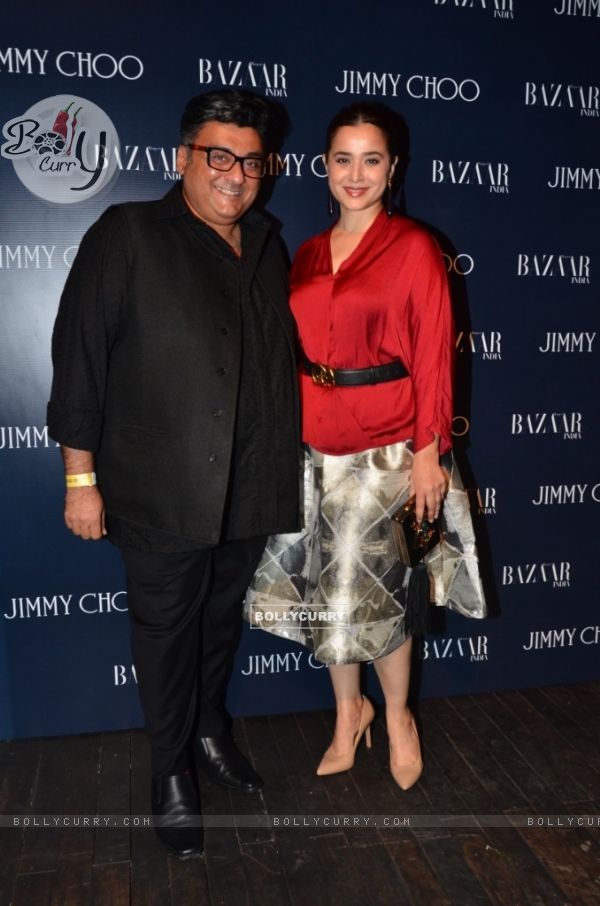 Simone Singh poses with Farhad Samar at the Launch of Jimmy Choo Eyewear Launch