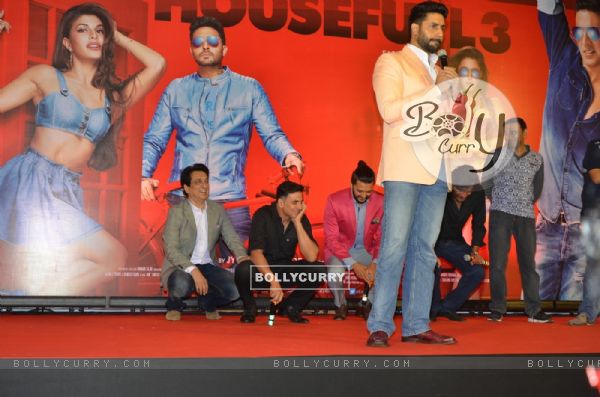 While Abhishek interacts with media, the rest sits down - at Housefull 3 Success Meet!