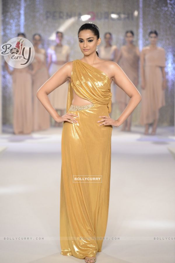 Sonam Kapoor in golden dress walks the ramp for Pernia Qureshi!