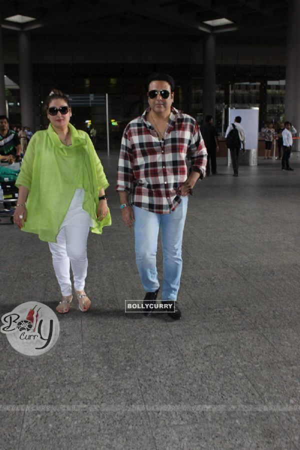 Govinda Snapped with wife Sunita Ahuja at Airport
