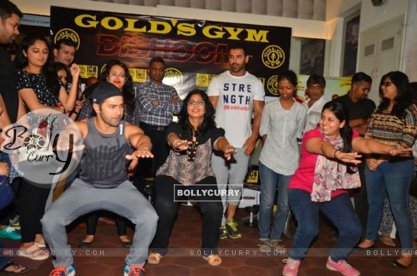 Varun Dhawan & John Abraham workouts with few female journalists during promotinal event of Dishoom