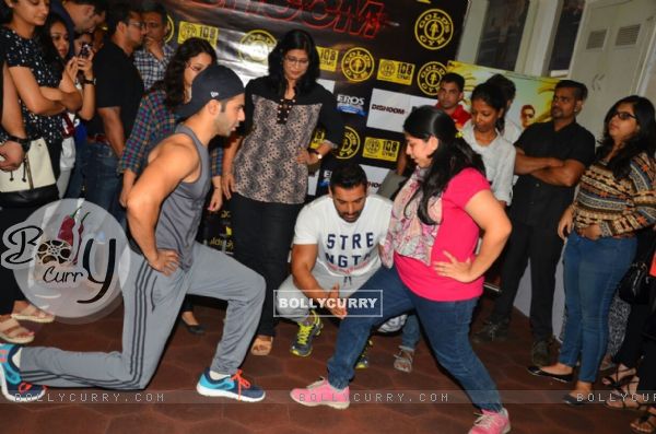 Workout Session with Varun Dhawan and John Abraham during an promotional event of 'Dishoom'