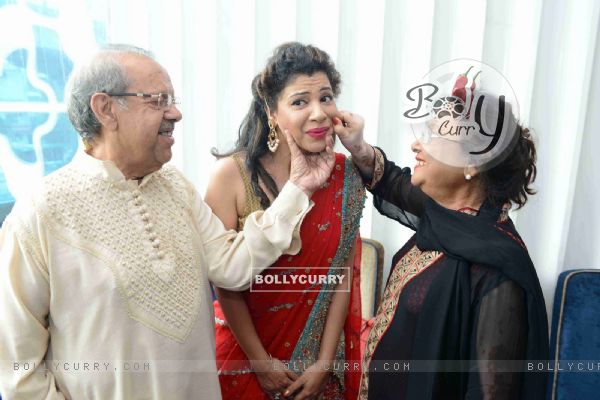 Sambhavana Seth poses with her mom and dad at Mehendi Ceremony!