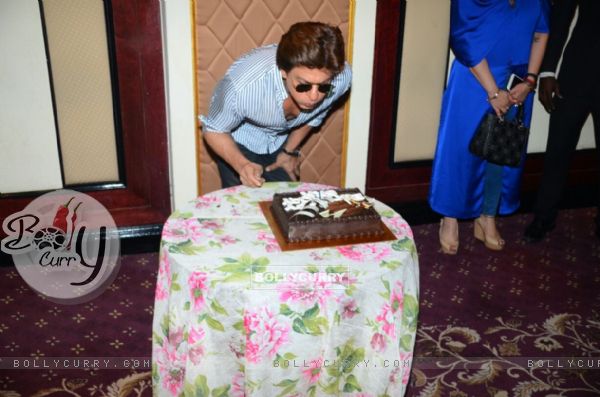 Shah Rukh Khan blowing his birthday candles