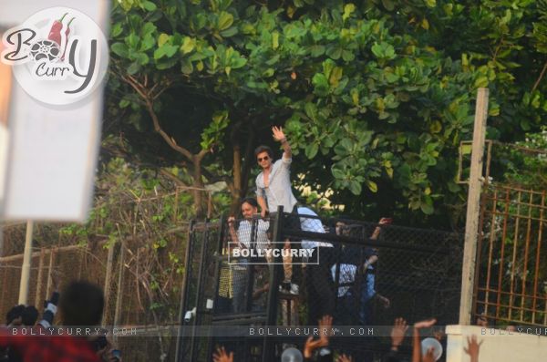 Shah Rukh Khan waves at his fans