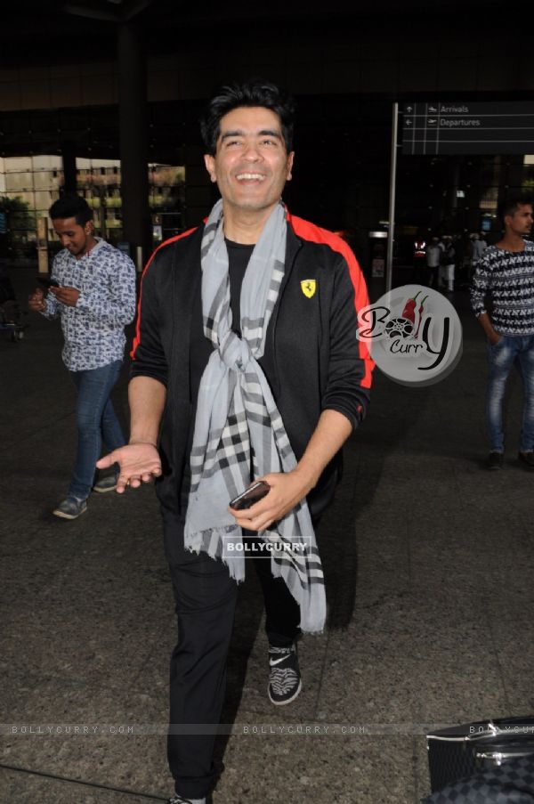 Manish Malhotra is all happy at the Airport