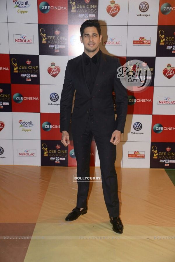 Sidharth's polka dot suit at the event