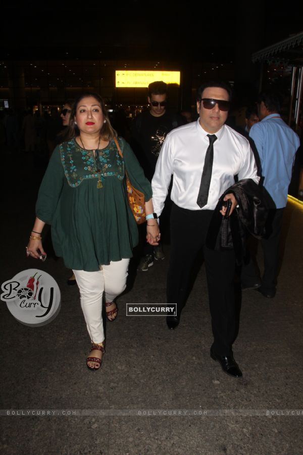 Govinda and his wife snapped at Airport