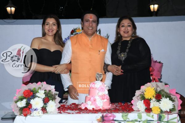 Govinda with his wife and daughter at his Birthday Bash