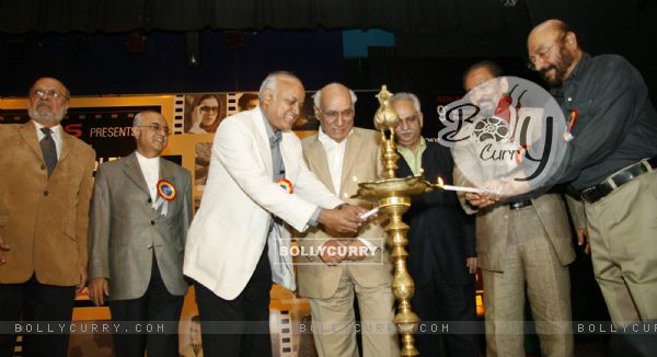 Celebrities lighting the lamp at the MAMI (Mumbai Academy of the Moving Image) film festival This year the festival will be dedicated to Hrishikesh Mukherjee In all, 125 films will be screened from 40 countries with special focus on South Africa