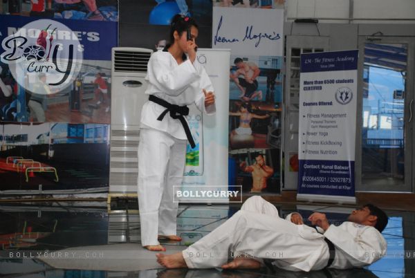 Bollywood actress Isha Koppikar doing Martial Arts with fitness-trainer Leena Mogre