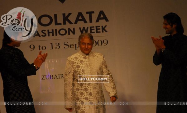 Ustad Amjad Ali Khan and his son Aman Ali Bangash and Ayan Ali Bangas showcases a design by Zubzir Kirmani on the catwalk during the Kolkata Fashion Week in Kolkata on 9th Sept 2009