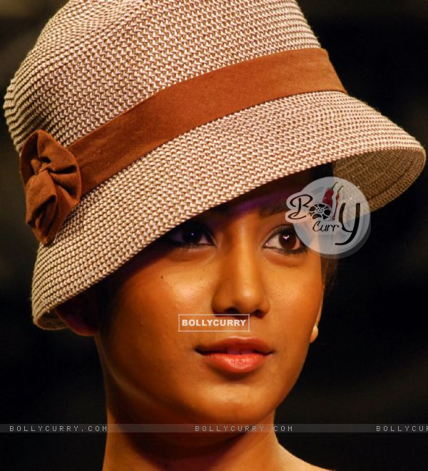 A model showcases a design by Leena Taneja on the catwalk during the Kolkata Fashion Week in Kolkata on 9th Sep 2009