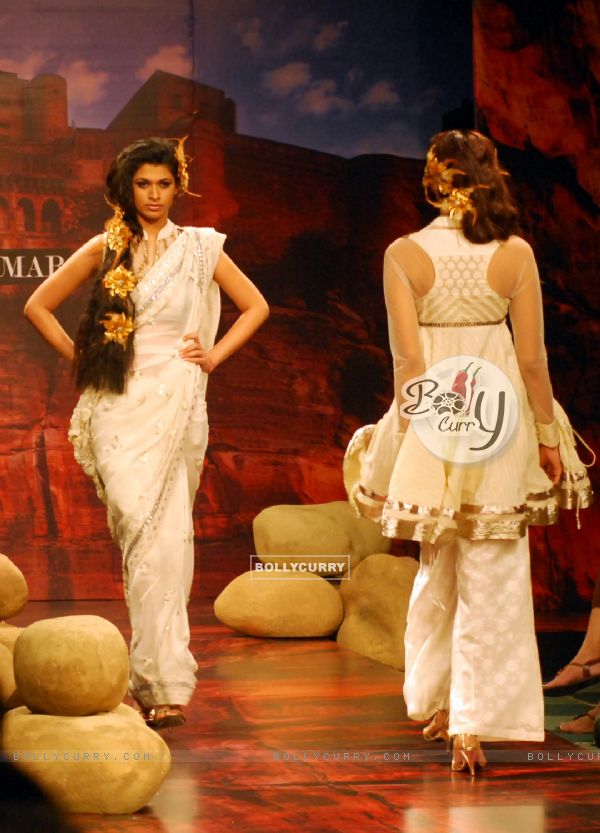 A model showcases a design by Ritu Kumar on the catwalk during the Kolkata Fashion Week in Kolkata on 9th Sep 2009