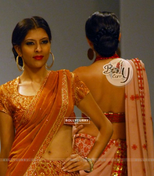 A model at the ramp display Satya Paul colloction during the Kolkata Fashion Week in Kolkata on 12th Sep 09